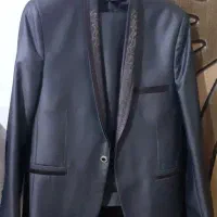یک دست کت و شلوار مردانه نو