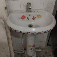 روشویی و شیر آب