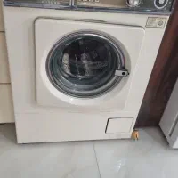 لباسشویی اتوماتیک و میز پینگ‌پنگ