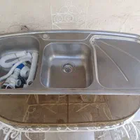 سینک اشپز خانه و دستگیره درب اتاق