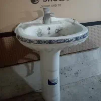 روشویی و شیر آب
