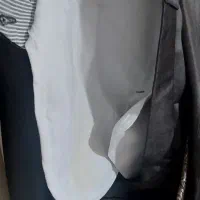 یک ست کامل کت و شلوار و کراوات قهوه ای