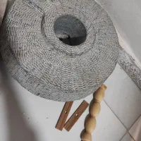 آسیاب دستی سنگی دستساز نوی نو همراه میز زیرش