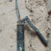 یک عدد پمپ گریس