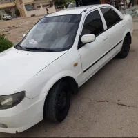 مزدا ۳۲۳ سفید اتومات سالم و کم خرج