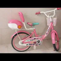 دوچرخه صورتی دخترانه درحد نو