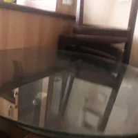 میز گرد شیشه ای همراه ۴ تا صندلی