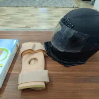 کلاه کاسکت و زانو بند طبی