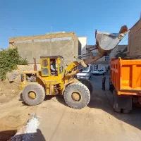 خدمات لودر و کمپرسی رستمی