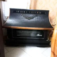 لوازم منزل بخاری، آینه، ساعت، شیشه، اتو
