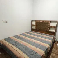 تخت دونفره بهمراه تشک، کمد و میز تلویزیون
