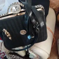 تعدادی لباس و کفش و پرده