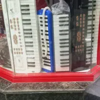 کالیمبا ملودیکا سازدهنی ارگ فلوت نی و کتاب آموزشی