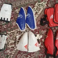 لباس تکواندو بع همراه تجهیزات