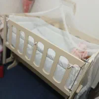 تخت کنار مادر نو نو