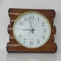 ساعت دیواری طرح چوب