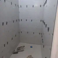 نصب کاشی وسرامیک باچسب وسیمان کلهر