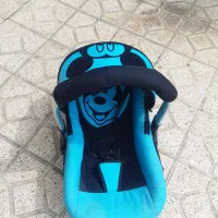 کریر و چند عدد لباس