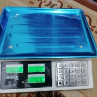 ترازو دیجیتال و دوخت پلاستیک