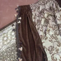 دوعدد کنار پرده دوخت شده
