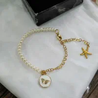 دستبند مرواریدی طرح طلا مناسب هدیه دخترانه زنانه