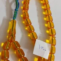 کهربا و سندلوس. تسبیح