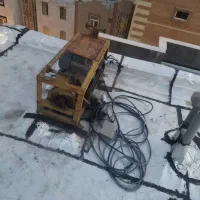 بالابر همراه با پاکت و سبد حمل مصالح