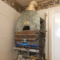 تعمیرات و نصب آبگرمکن پکیج شیرآلات پمپ آب