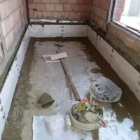 کارگر نیمه وارد به سنگ کاری، دوغاب ریزی