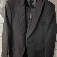کت شلوار همراه با جلیقه