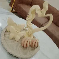 دکوری مجسمه شمع و پروانه