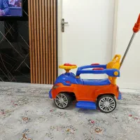 ماشین اسباب بازی دسته دار