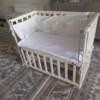 تخت نوزاد کنار مادر حالت گهواره با توری