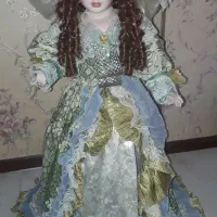 عروسک سرامیکی موزیکال