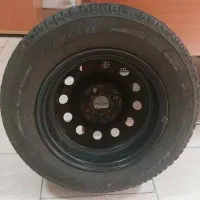 یک حلقه لاستیک با رینگ کامل - خوردو تیبا