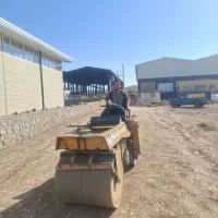 کوبیدن خاک توسط غلطک15تن30تنی اجاره قلتک کمپکی