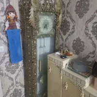 ساعت برنجی و بوفه برنجی