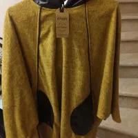 مانتو پانچ کلاه‌دار چرمی