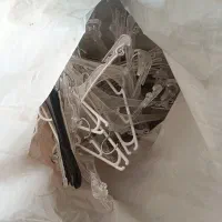 آویز لباس مانتو و پیراهن لباس زنانه نو نو