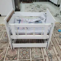 تخت گهواره ای کودک
