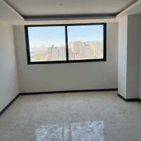 ۹۰ متر مجتمع مسکونی کلید نخورده چسبیده به حرم مطهر