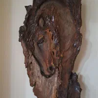 کار پتینه و مجسمه روی  پوست چوب درخت