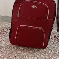 چمدون دسته خراب پشت پارکی جزوی داره