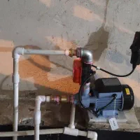 لوله کشی ساختمان نصب پمپ و هواگیری