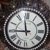 ساعت دیواری دوطرفه