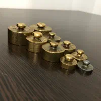 وزنه ترازوی زرگری قدیمی 9عدد با مهر شیر خورشید