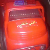 ماشین باری و آتش نشانی و تفنگ