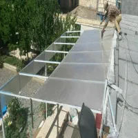 نصب و اجرای سازه گلخانه و سایبان شید توری