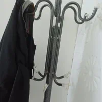 جا لباسی|بندرخت و رخت‌آویز|مشهد, حضرت حجت|دیوار