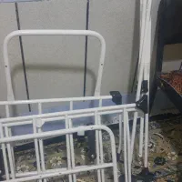 گهواره کنار تخت مادر